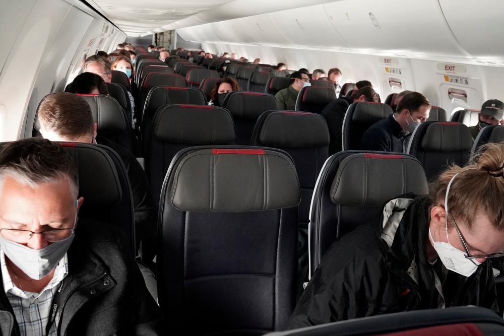 People fly on a media flight aboard a Boeing 737 MAX airplane from Dallas Fort Worth Airport to Tulsa, Oklahoma in Dallas, Texas on Wednesday. – REUTERSPIX
