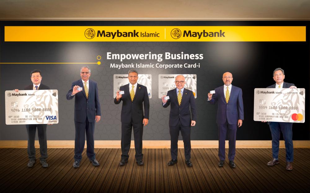 (From left) Ng, Maybank senior vice president &amp; head cards B. Ravintharan, Hamirullah, Maybank community financial services group CEO Datuk John Chong, Mohamed Rafique and Ong.