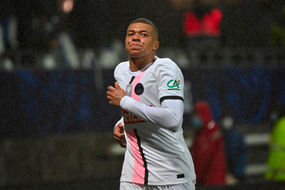 Paris Saint-Germain's French forward Kylian Mbappe celebrates after scoring a goal during the French Cup round of 16 football match between Vannes OC and Paris Saint-Germain (PSG) at La Rabine Stadium in Vannes, western France, on January 3, 2022. AFPpix