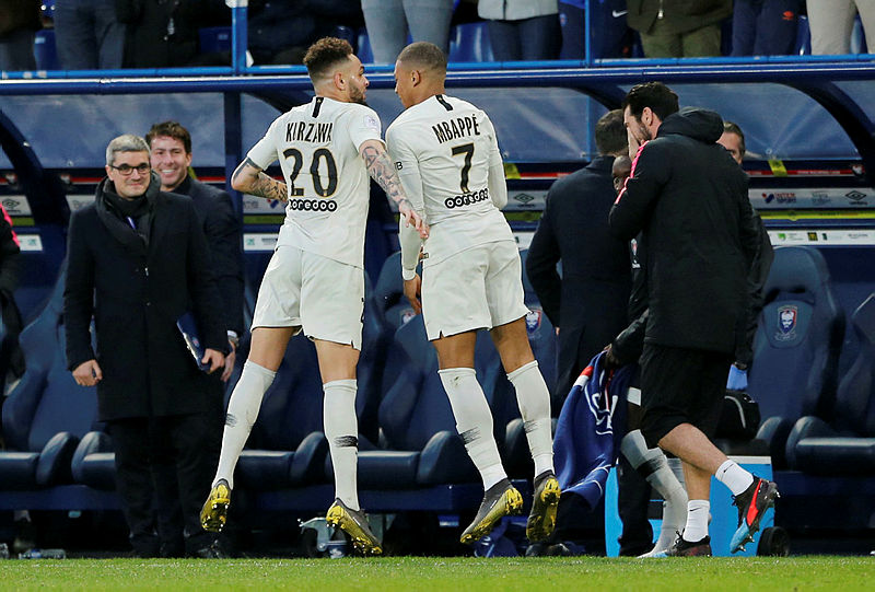 Kylian Mbappe (R) Layvin Kurzawa celebrate after scoring against Caen, on March 3 2019. — AFP