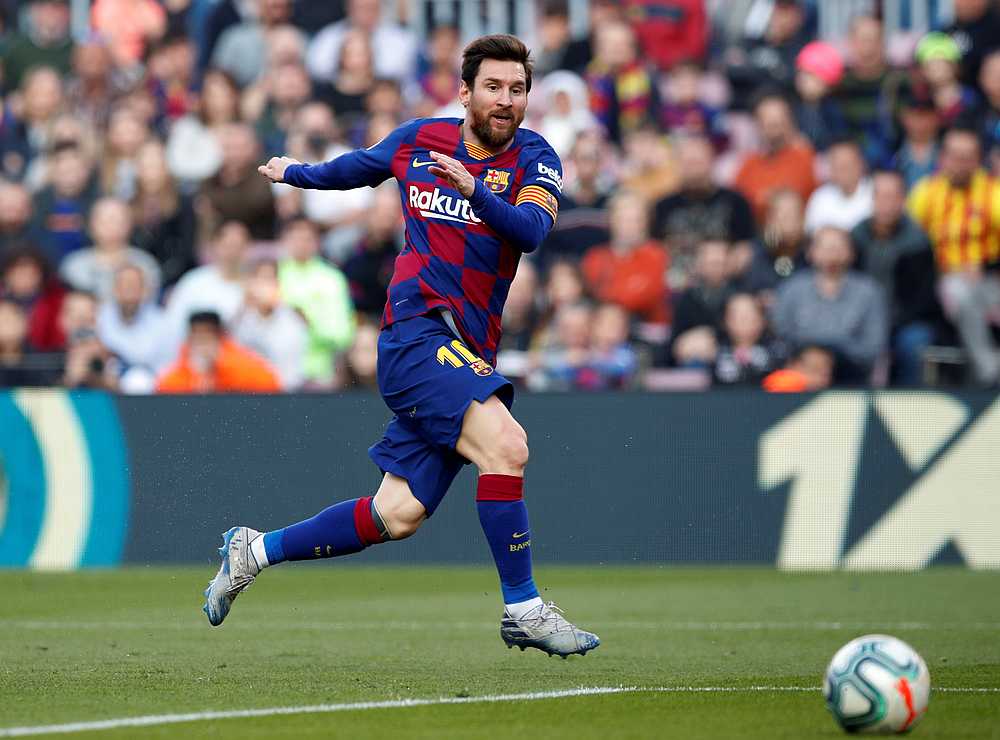 Messi scores four as Barca jump above defeated Madrid before Clasico