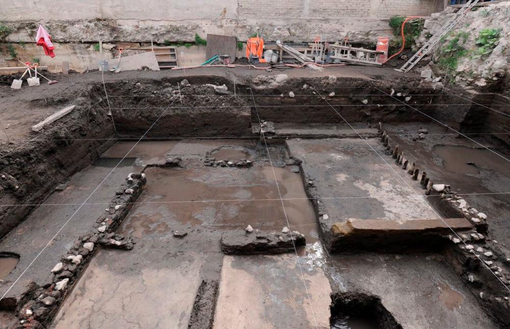 A view of the excavations where an altar unearthed by archaeologists at a plot near Plaza Garibaldi in downtown Mexico City, in this photo distributed to Reuters by the National Institute of Anthropology and History on November 30, 2021. Mexico's National Institute of Anthropology and History/Handout via REUTERSpix
