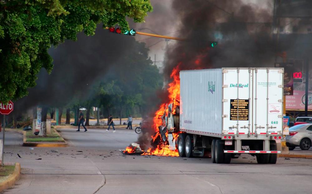 A truck burns in a street of Culiacan, state of Sinaloa, Mexico, on Oct 17, 2019. — AFP