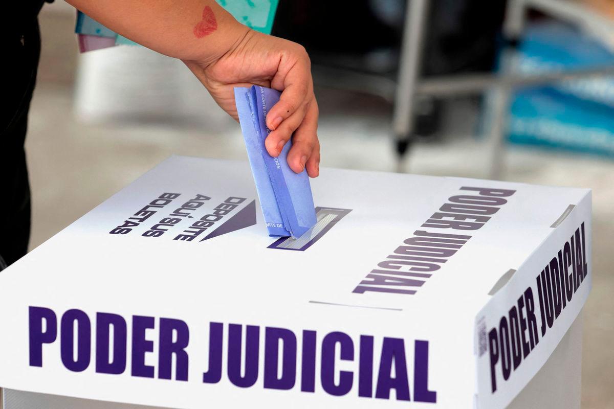 Polls opened Sunday in elections making Mexico the world’s only country to select its judges at all levels by popular vote. (Photo by STRINGER / AFP)