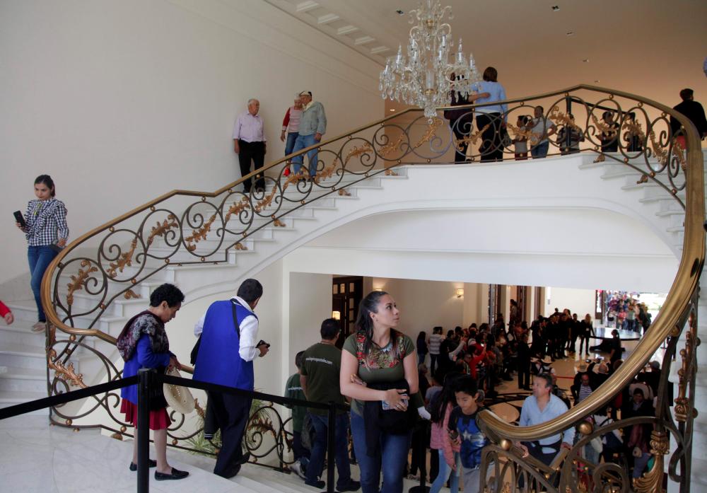 People visit Los Pinos presidential residence in Mexico City, on Dec 2, 2018 after Mexico's newly inaugurated president Andres Manuel Lopez Obrador decided not to live in the sumptuous residence and instead open it to the public as a cultural centre. — AFP