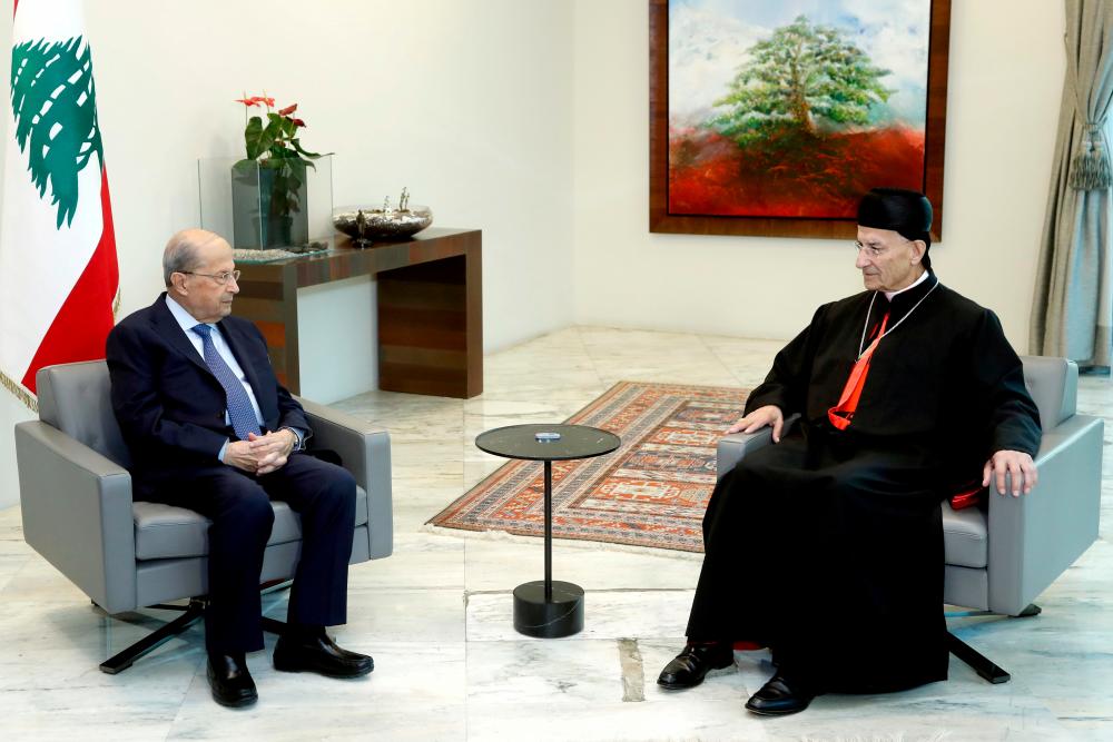 Lebanon's President Michel Aoun meets with Maronite Patriarch Bechara Boutros Al-Rai at the presidential palace in Baabda, Lebanon October 26, 2021. Dalati Nohra/Handout via REUTERSpix