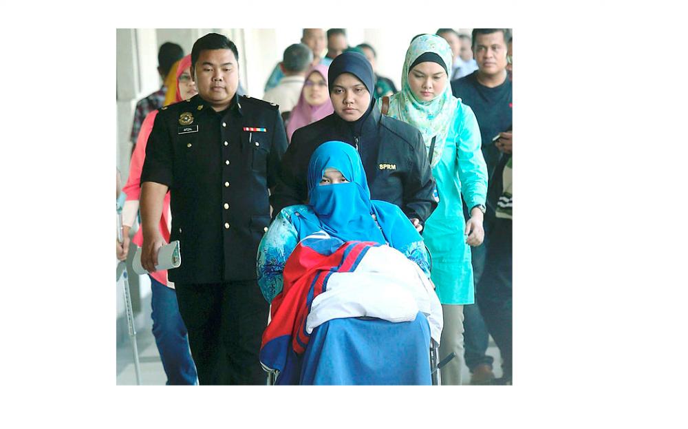 Filepix of Siti Nor Hakiki Abdullah, on a wheelchair, on May 30, 2017. — BBX-Images