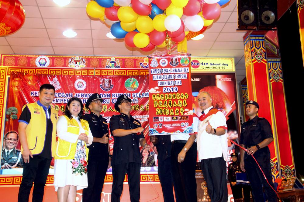 Malacca police chief Raja Shahrom Raja Abdullah launches the Crime Prevention and Safe House Campaign in conjunction with the Chinese New Year (TBC) 2019 at Jonker Walk, on Jan 25, 2018. — Bernama