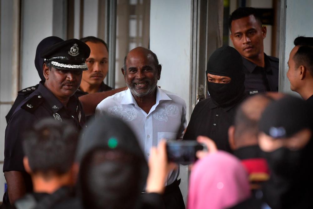 Seremban Jaya assemblyman P. Gunasekaran, 60, was among three individuals who faced charges of supporting the LTTE terrorist group, is seen leaving the Ayer Keroh sessions court in Malacca today. - Bernama
