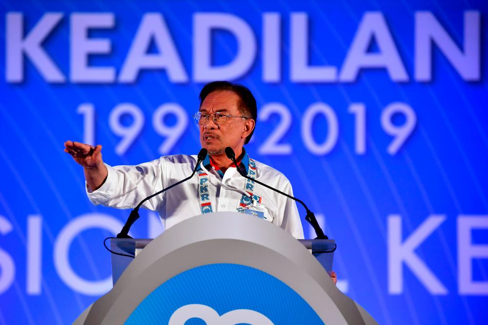 PKR president Datuk Seri Anwar Ibrahim gives his speech during the final day of the national congress at the Malacca International Trade Centre (MITC), today. - Bernama
