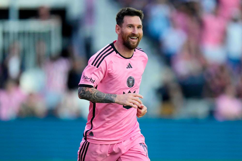 Lionel Messi #10 of Inter Miami CF celebrates after scoring his second goal during the second half against the Orlando City SC at DRV PNK Stadium on March 02, 2024 in Fort Lauderdale, Florida/AFPPix