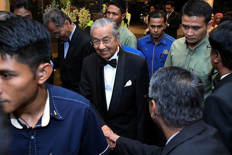 Prime Minister Tun Dr Mahathir is greeted by guests at the Malaysian Medical Association (MMA) Special Night with Tun Dr Mahathir Mohamad and Tun Dr Siti Hasmah Mohd Ali here last night. — Bernama