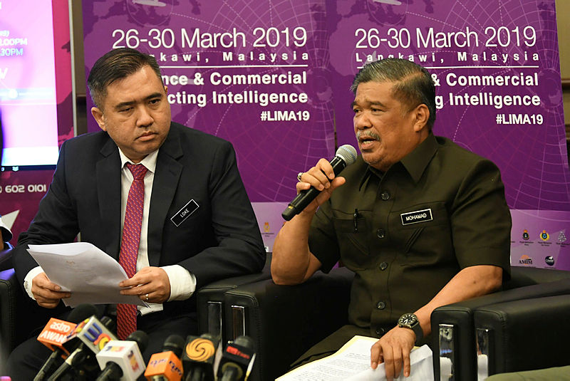 Defence Minister Mohamad Sabu (R) and Transport Minister Anthony Loke, during a press ocnference after Lima’ 19, on March 30, 2019. — Bernama