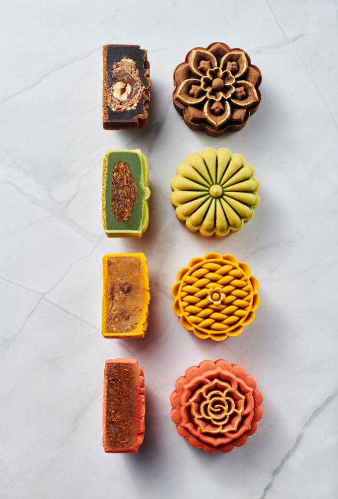 $!The RuMa Hotel and Residences presents four flavours, (from top) Callebaut 811, Ondeh, honey longan and Nyonya sambal hae bee.