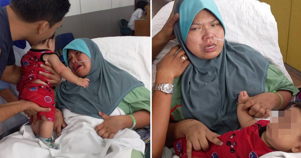 A tearful Nur Fadilla, with her baby.