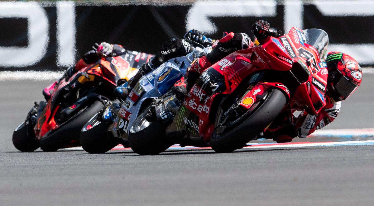 Ducati Lenovoi Team's French MotoGP rider Francesco Bagnaia (1st R) competes during the qualifying of motorcycle Czech Moto GP Grand Prix at the Masaryk circuit in Brno, Czech Republic on July 19, 2025. - AFPPIX
