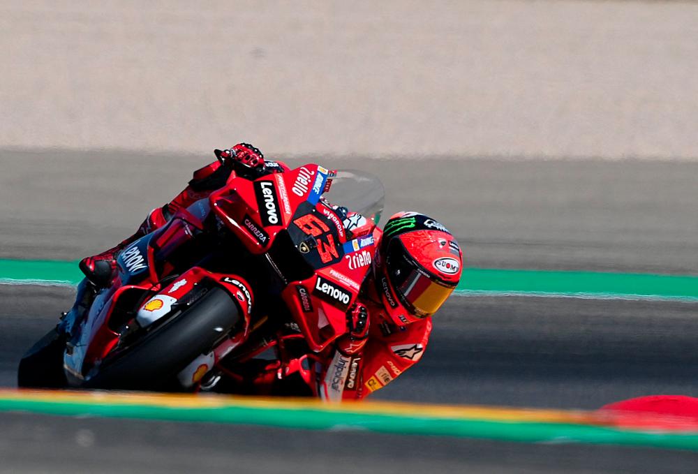 Ducati Italian rider Francesco Bagnaia rides his bike during the MotoGP fourth free practice session ahead of the Moto Grand Prix of Aragon at the Motorland circuit in Alcaniz on September 17, 2022. - AFPPIX