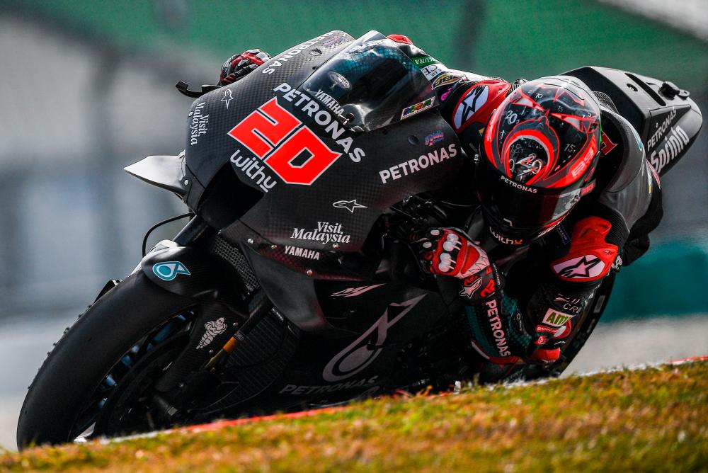 Petronas Yamaha SRT's French rider Fabio Quartararo takes a corner during the last day of the pre-season MotoGP winter test at the Sepang International Circuit in Sepang on February 9, 2020. - AFP