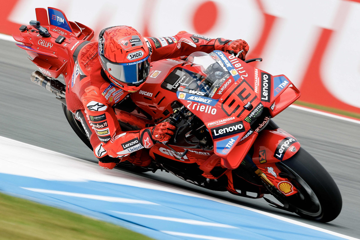 Ducati Lenovoi Team’s Spanish MotoGP rider Marc Marquez takes a corner during a free practice ahead 2024 Netherlands MotoGP Grand Prix at the TT Circuit Assen, in Assen on June 27, 2025. - AFP