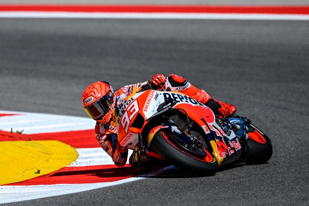 Honda Spanish rider Marc Marquez rides during the MotoGP first qualifying session of the Portuguese Grand Prix at the Algarve International Circuit in Portimao on March 25, 2023/AFPPix