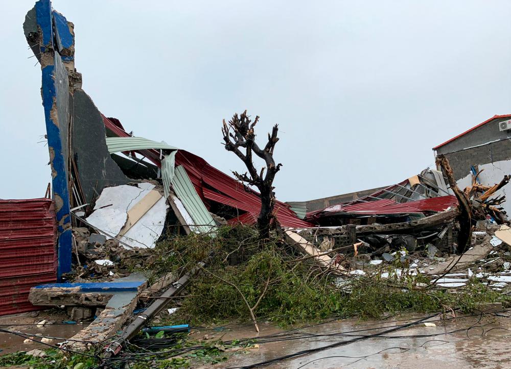 This handout picture taken and released on March 18, 2019 by the United Nations World Food Programme (WFP) shows damages in Beira, Mozambique, in the aftermath of the passage of the cyclone Idai. — AFP