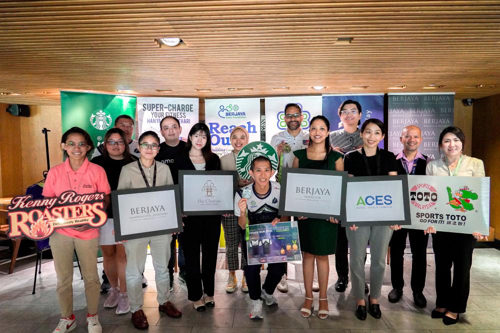Soh (centre) and partners for BTS Tower Run 2024