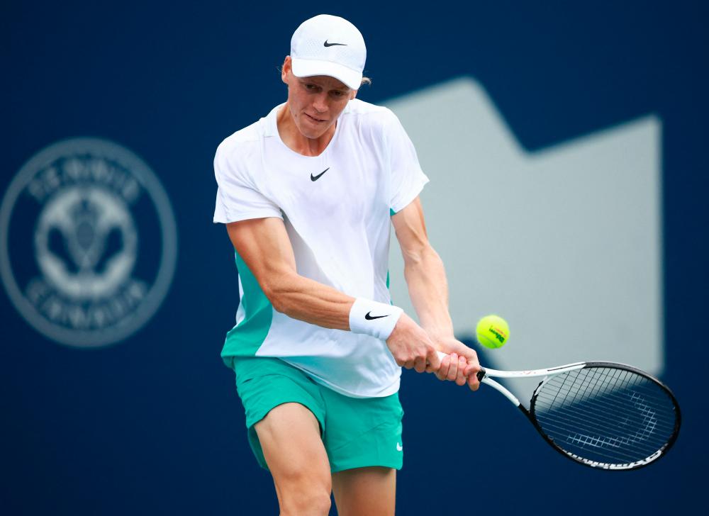 TORONTO, ON - AUGUST 13: Jannik Sinner of Italy hits a shot against Alex De Minaur of Australia in the Singles Final during Day Seven of the National Bank Open, part of the Hologic ATP Tour, at Sobeys Stadium on August 13, 2023 in Toronto, Canada. - AFPPIX