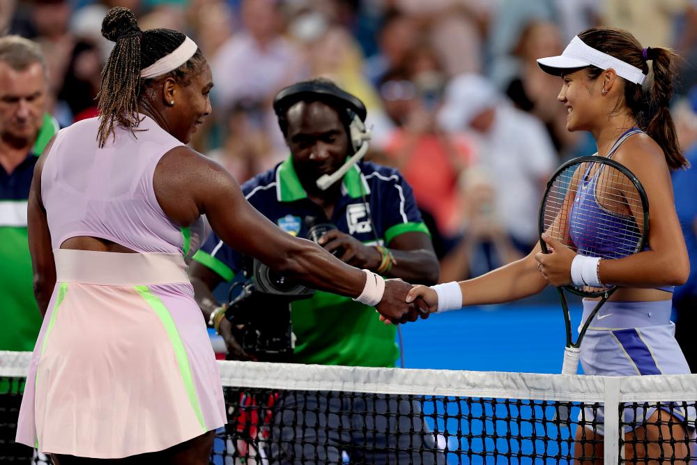 MASON, OHIO - AUGUST 16: Serena Williams congratulates Emma Raducanu of Great Britain after their match during the Western &amp; Southern Open at Lindner Family Tennis Center on August 16, 2022 in Mason, Ohio. - AFPPIX
