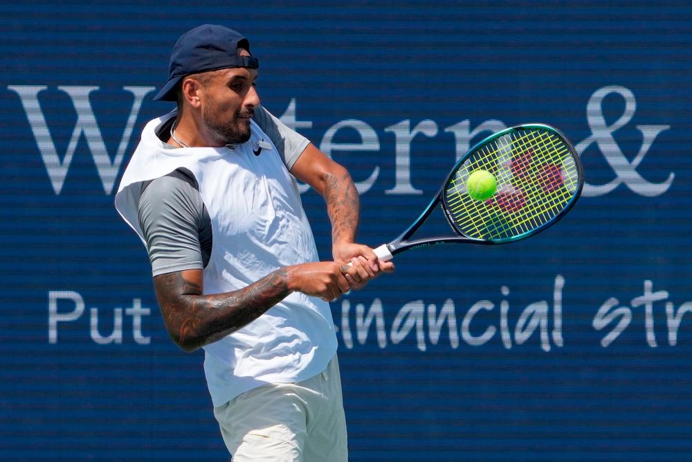 MASON, OHIO - AUGUST 16: Nick Kyrgios of Australia plays a backhand during his match against Alejandro Davidovich Fokina of Spain during the Western &amp; Southern Open at the Lindner Family Tennis Center on August 16, 2022 in Mason, Ohio. AFPPIX