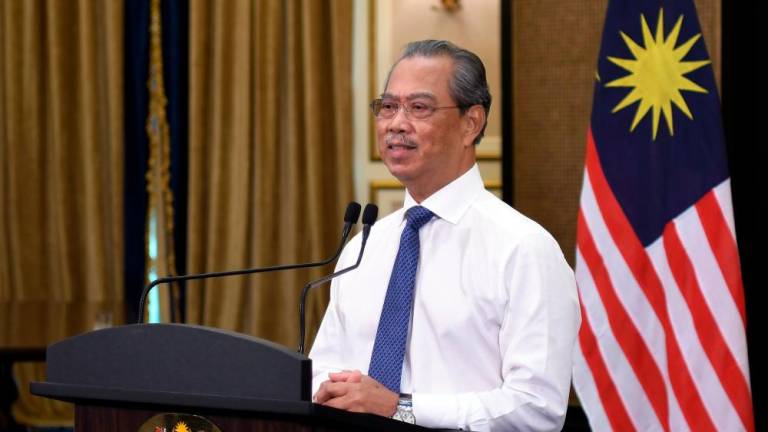 Muhyiddin pays tribute to Malaysian Covid-19 frontliners