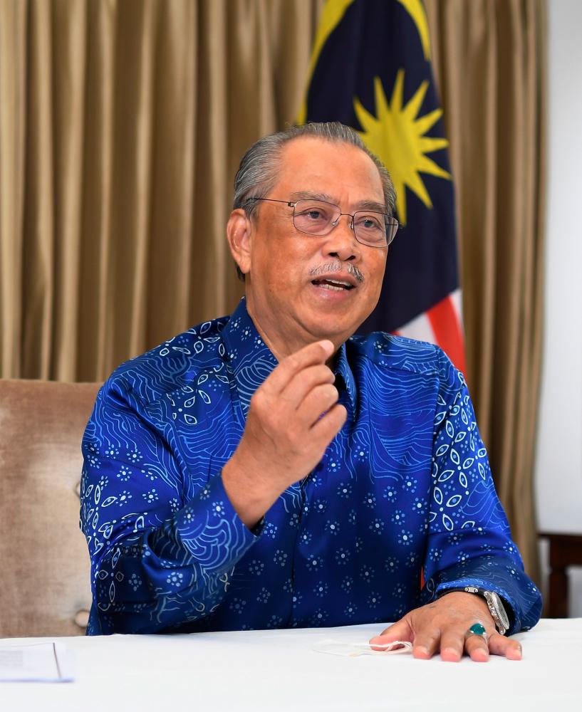 Prime Minister, Tan Sri Muhyiddin Yassin while delivering a special announcement regarding the benefits for individuals who are fully vaccinated today. — Bernama