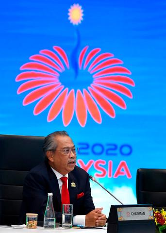 Prime Minister Tan Sri Muhyiddin Yassin delivering his keynote address at the Asia Pacific Economic Cooperation (Apec) Economic Leaders’ Meeting (AELM) virtually which was also attended by 21 economic leaders in the Asia Pacific region last night.-Bernama