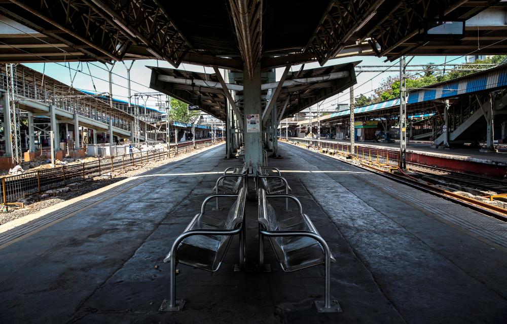 A general view of deserted Boriwali suburban railway station in Mumbai, India, 23 March 2020. - EPA