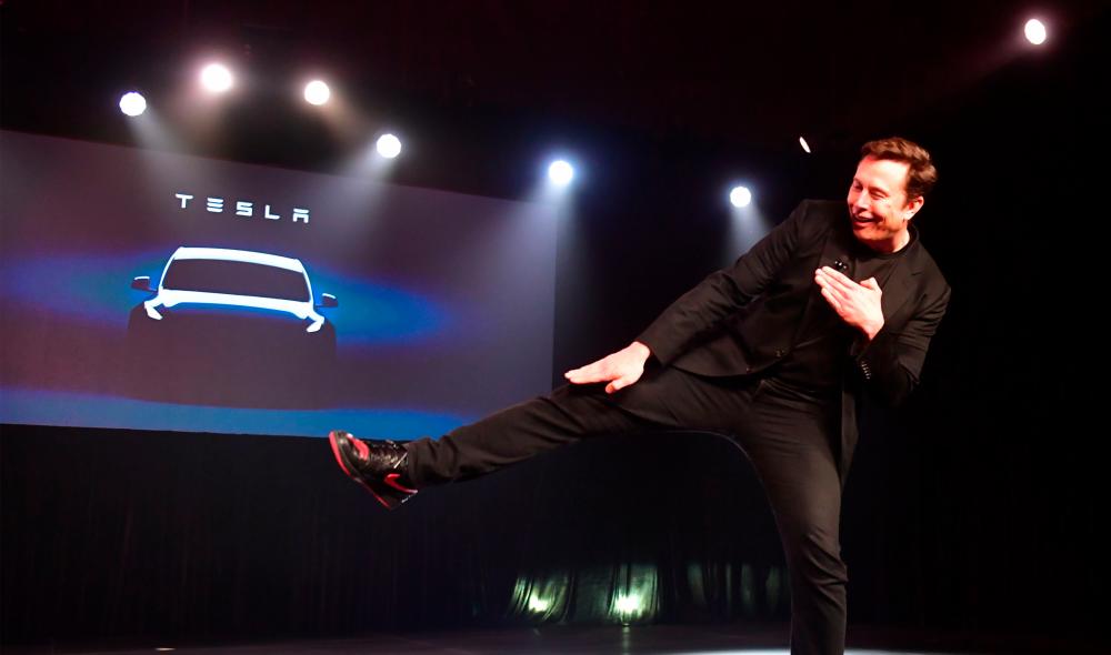 Musk gestures during the unveiling of the Tesla Model Y in Hawthorne, California on March 14, 2019. Tesla's value reached US$207.2 billion, according to Bloomberg. – AFPPIX