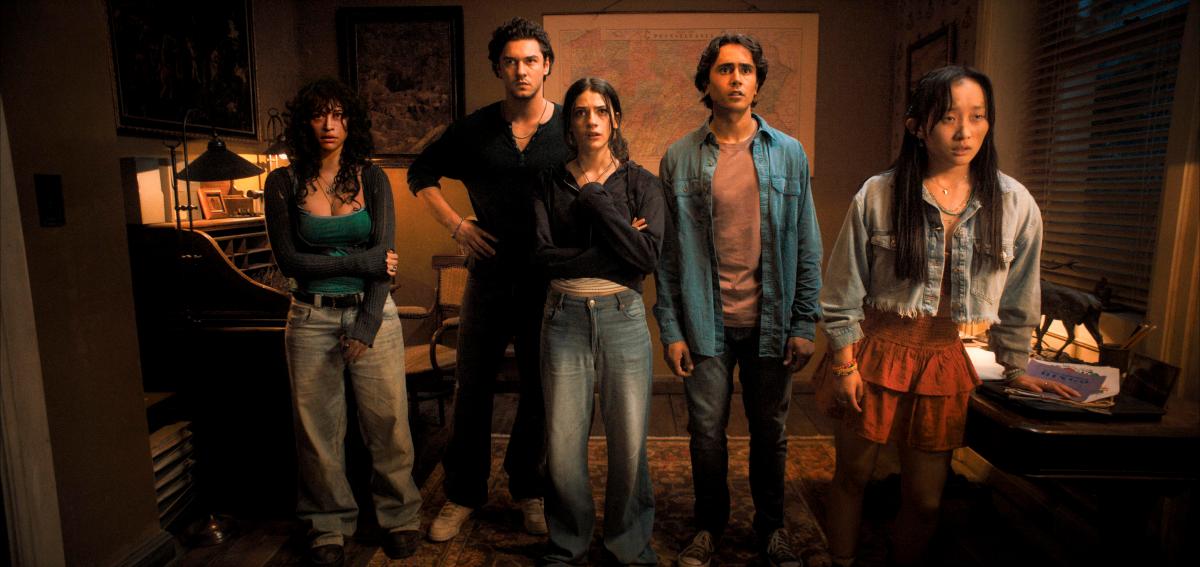 (From left) Nina (A’zion), Abe (Cameli), Clover (Rubin), Max (Cimino) and Megan (Yoo) huddle together as tension rises inside the eerie visitor center.