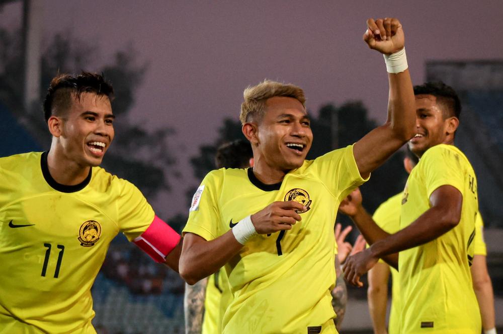 YANGON, Dec 21 -- National player Mohamad Faisal Abdul Halim celebrates scoring the first goal for the Malaysian team in the AFF Mitsubishi Electric Cup 2022 group B match between Malaysia and Myanmar at Thuwunna Stadium yesterday. BERNAMAPIX