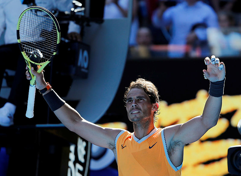 Rafael Nadal reacts after winning the match against Tomas Berdych. — AFP