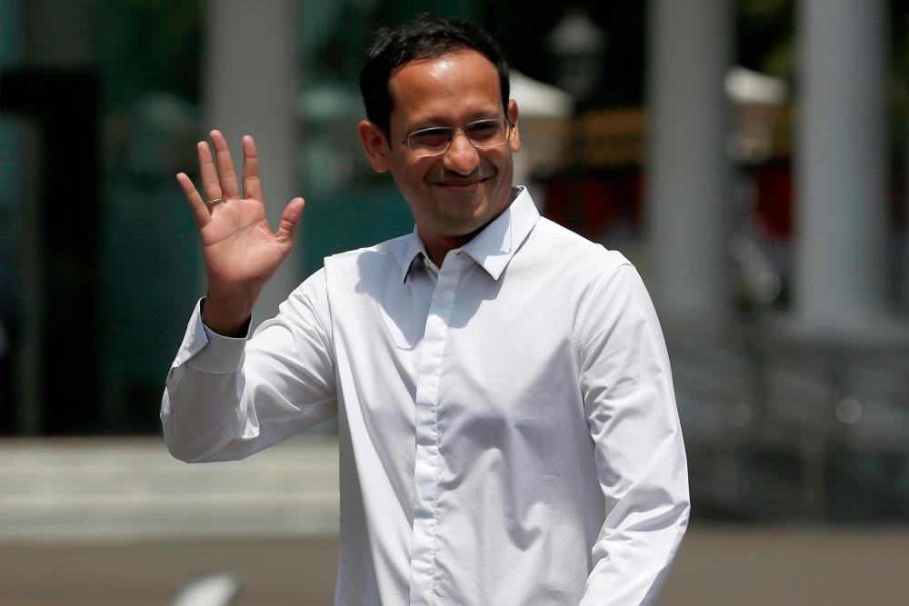 Nadiem Makarim, founder of the Indonesian ride-hailing and online payment firm Gojek waves to journalists as he arrives at the Presidential Palace in Jakarta, Indonesia, October 21, 2019. - Reuters