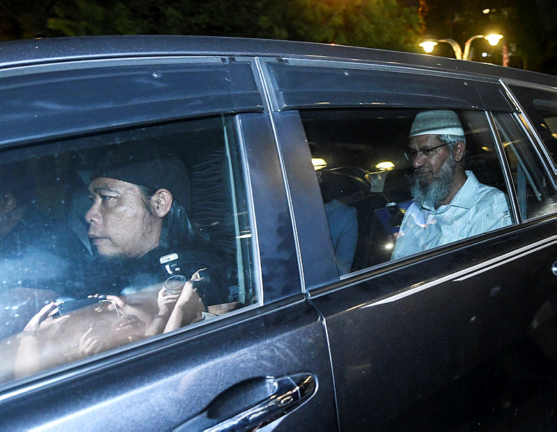 Filepix taken on Aug 16, of Zakir Naik leaving Bukit Aman following questioning.