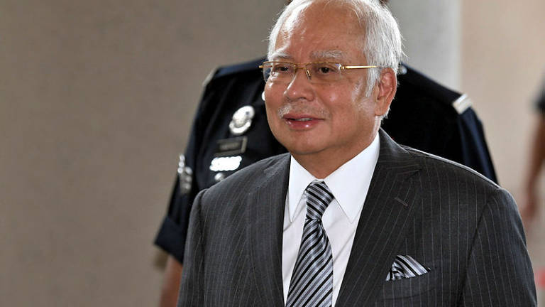 Prosecution urges court to convict Najib on seven charges over SRC funds