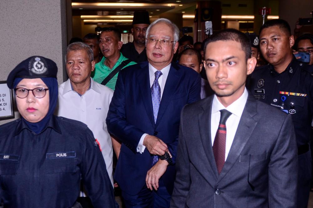 Najib arrives for his trial at the Duta Court Complex, on March 3, 2019. — Sunpix by Amirul Syafiq