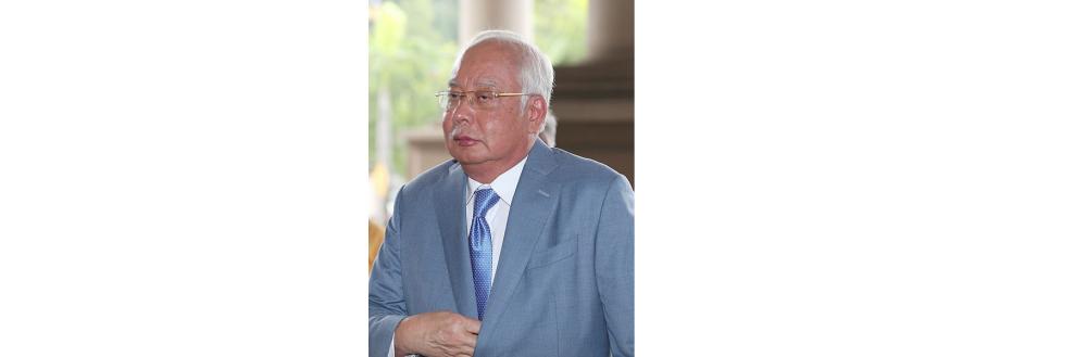 Former Prime Minister Datuk Seri Najib Abdul Razak attending proceedings on the SRC International case at the Kuala Lumpur High Court today. — BBXpress