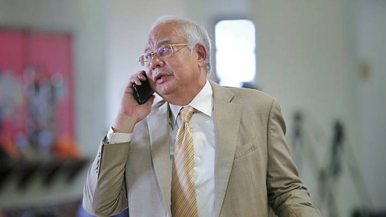 Cops to record Najib’s statement today over Facebook posting