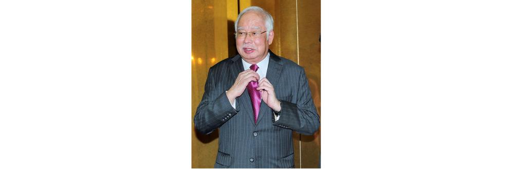 Former Prime Minister Datuk Seri Najib Abdul Razak attending the SRC case proceedings today at the Kuala Lumpur court. — BBXpress