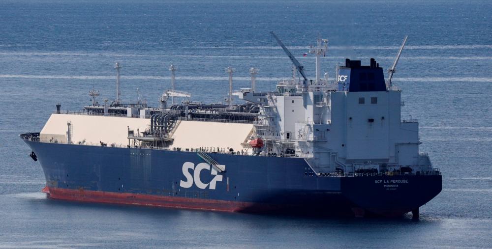 LNG tanker SCF La Perouse sailing along Nakhodka Bay near the port city of Nakhodka, Russia, yesterday. Soaring demand for LNG and buyers shunning Russian cargoes and vessels have led to more long-term charters, limiting the supply of vessels to the spot market. – Reuterspix