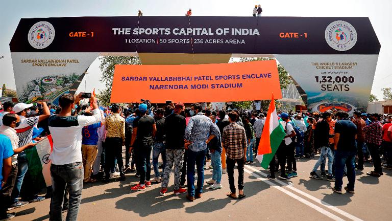 Excited Indian fans stream into world's biggest cricket stadium