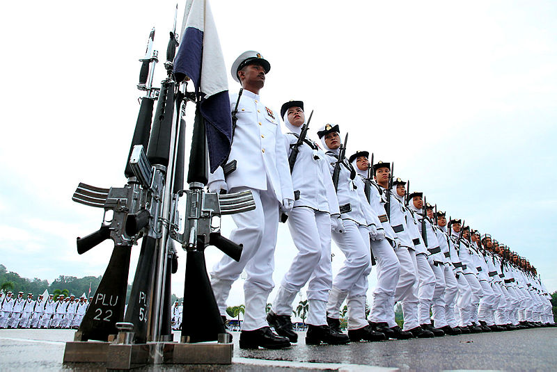 Naval officers prepare for the marchpast ceremony held in conjunction with the Navy’s 85th anniversary at its headquarters, in Lumut, on April 27, 2019. — Bernama