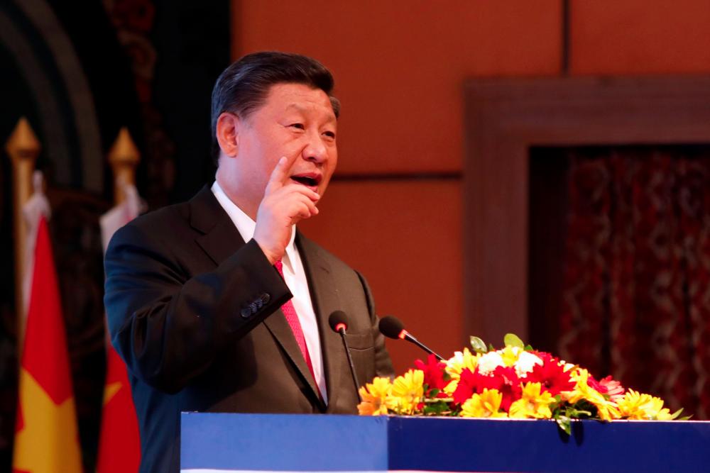 In this handout photo released by the The Rising Nepal newspaper and taken on Oct 12, 2019, China's President Xi Jinping speaks during a welcome dinner in Kathmandu. — AFP