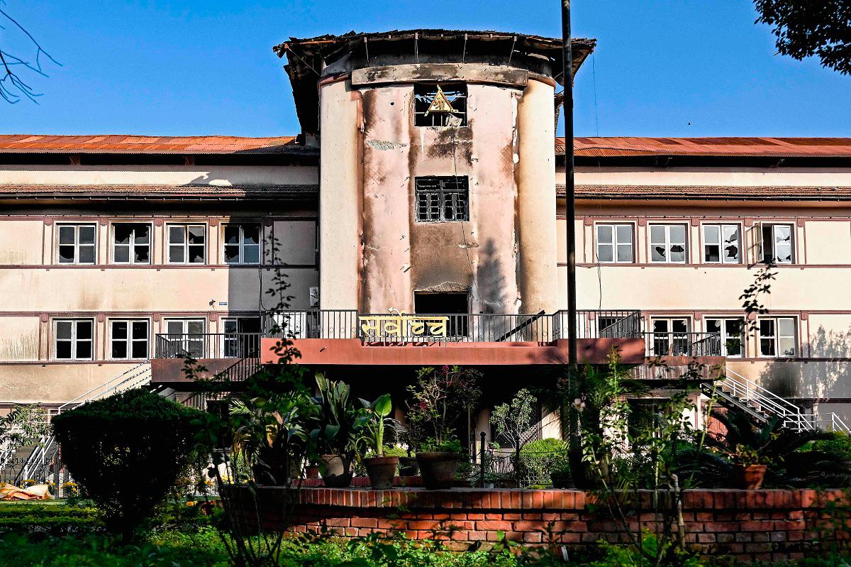 A general view shows the fire-damaged Supreme Court building in Kathmandu on October 15, 2025. - Prakash MATHEMA / AFP