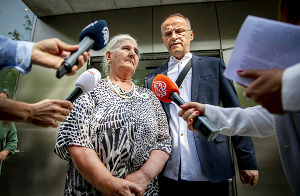 A member of a group of victims’ relatives, “the Mothers of Srebrenica” answers journalists’ questions in front of Dutch supreme court on July 19, 2019 in the Hague, following the ruling in the cassation proceedings regarding the responsability of Dutch state in Srebrenica massacre. — AFP